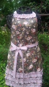 Fitted style in a stone grey with roses and pink check ruffles